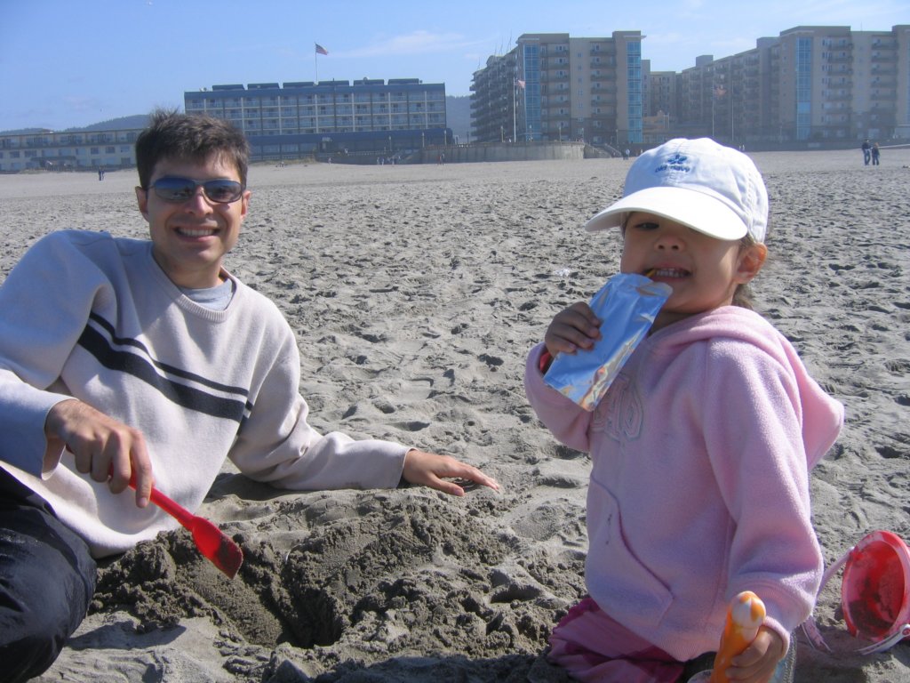 dadandallyattheseasidebeachdadwastryingtodigdeepholesbutallykeptfillingthemin.jpg