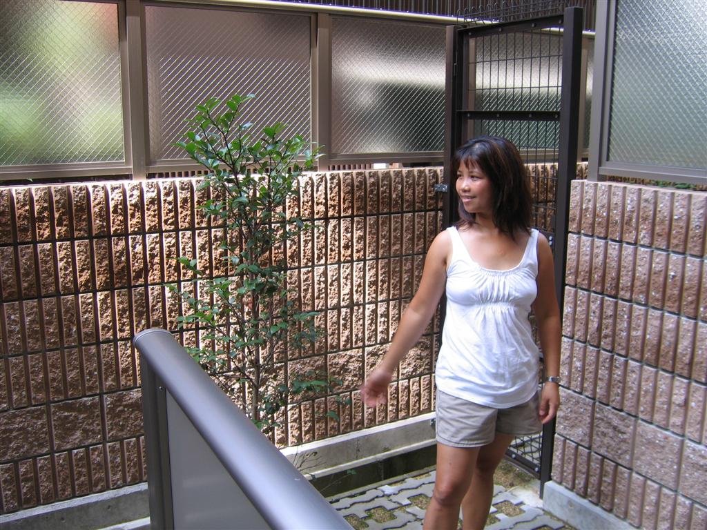 helenrelaxesinthemodestbackyard.jpg