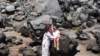 allyandmomrestingonarock_small.jpg